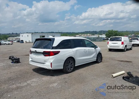 2025 Honda Odyssey Touring z USA, uszkodzony, nr VIN 5FNRL6H87SB001310